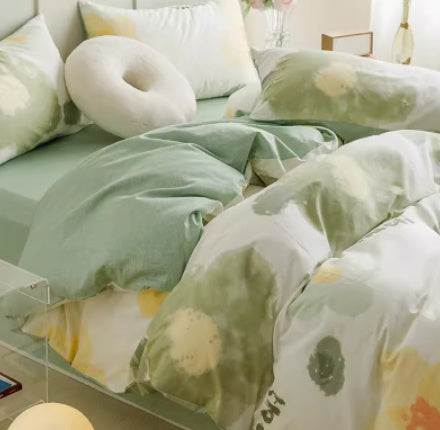 Juego de cama de cuatro piezas de algodón puro con degradado de color simple
