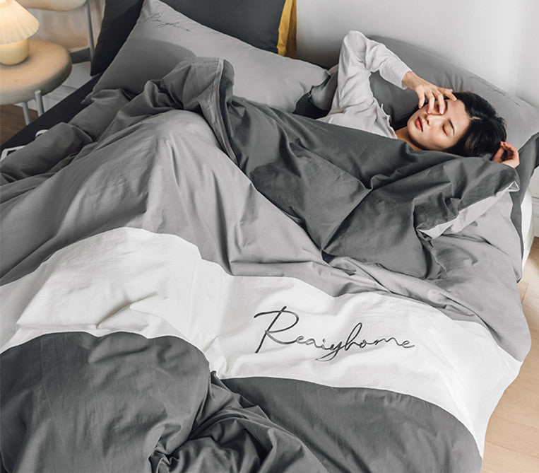 Sábana de algodón lavado de cuatro piezas para cama doble individual