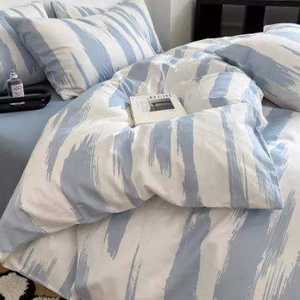 Juego de cama de cuatro piezas de algodón puro con degradado de color simple