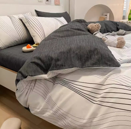 Juego de cama de cuatro piezas de algodón puro con degradado de color simple