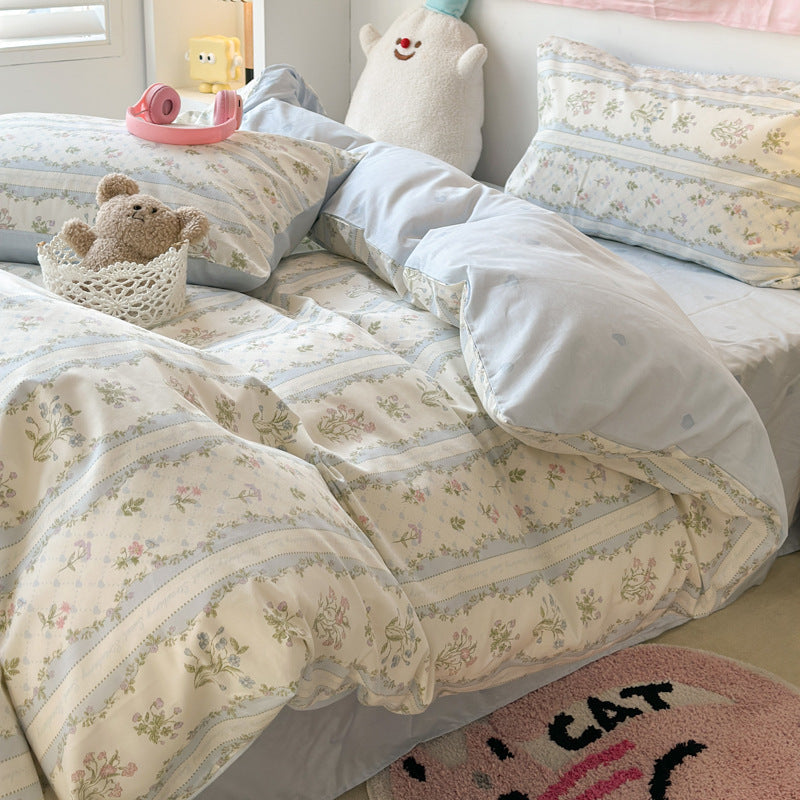 Juego de cama de cuatro piezas de algodón puro para dormitorio de estudiantes con funda nórdica y sábanas