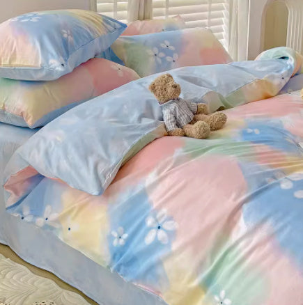 Juego de cama de cuatro piezas de algodón puro con degradado de color simple