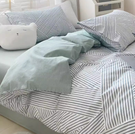 Juego de cama de cuatro piezas de algodón puro con degradado de color simple