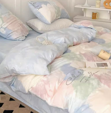 Juego de cama de cuatro piezas de algodón puro con degradado de color simple