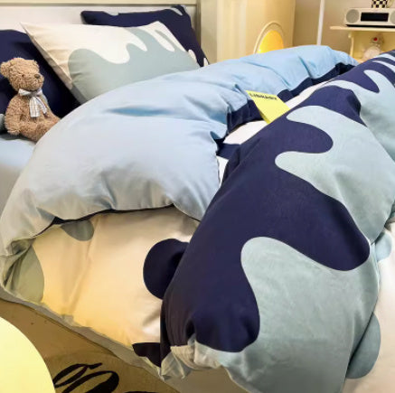 Juego de cama de cuatro piezas de algodón puro con degradado de color simple