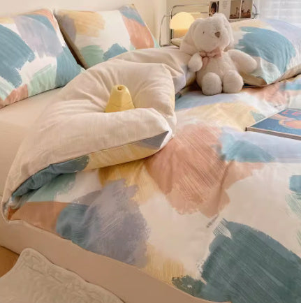 Juego de cama de cuatro piezas de algodón puro con degradado de color simple