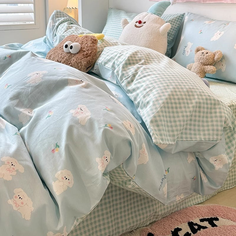 Juego de cama de cuatro piezas de algodón puro para dormitorio de estudiantes con funda nórdica y sábanas