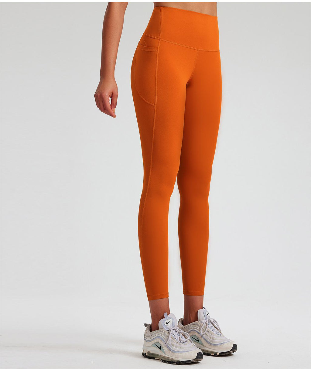Pantalones de yoga antibacterianos de alta elasticidad con tacto nude, cintura alta, moldeadores de cadera, color melocotón, pantalones de entrenamiento para mujer