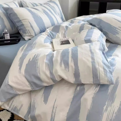 Juego de cama de cuatro piezas de algodón puro con degradado de color simple