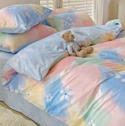 Juego de cama de cuatro piezas de algodón puro con degradado de color simple