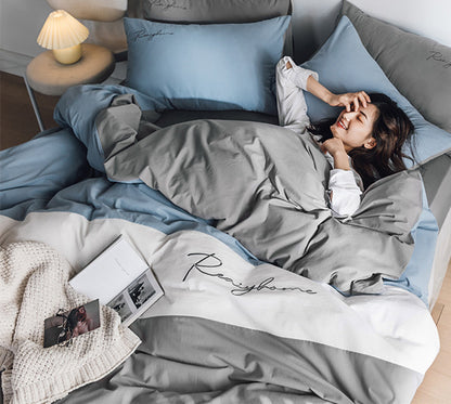 Sábana de algodón lavado de cuatro piezas para cama doble individual