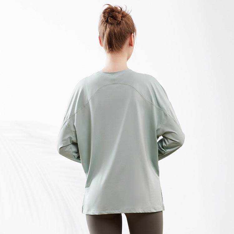 Camiseta holgada de manga larga con estampado de letras para mujer, ropa de yoga holgada, deportiva, con abertura en el dobladillo, informal, larga, para entrenamiento