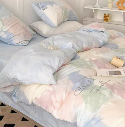 Juego de cama de cuatro piezas de algodón puro con degradado de color simple