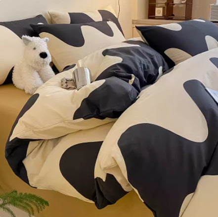 Juego de cama de cuatro piezas de algodón puro con degradado de color simple